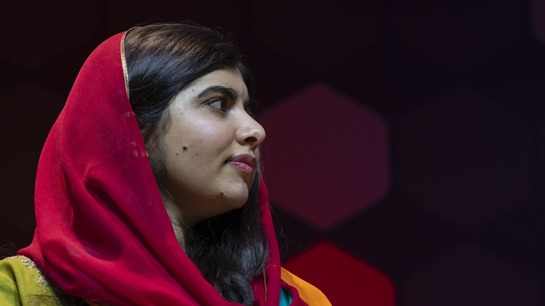 Malala Yousafzai wearing red hijab