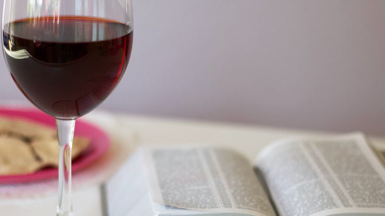 Glass of wine and a Bible