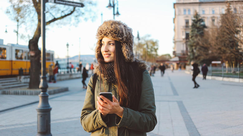 A young woman wearing a ushanka