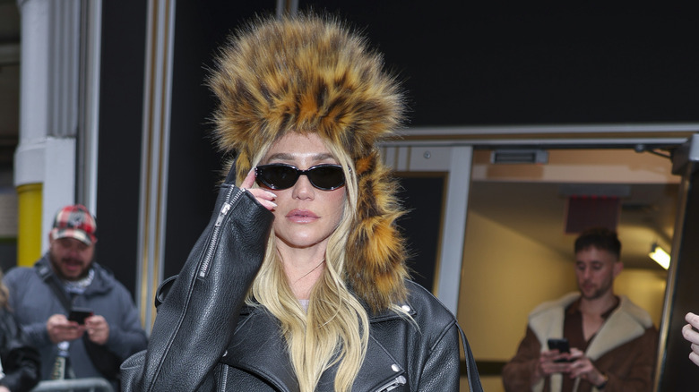Kesha seen wearing a ushanka-inspired hat, April 2025