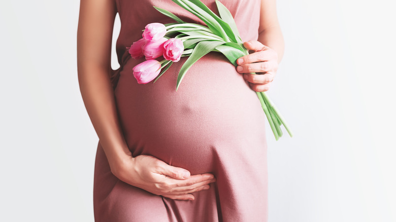 the abdomen of a pregnant woman