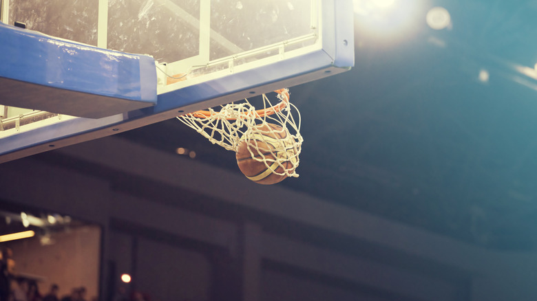 basketball going into hoop