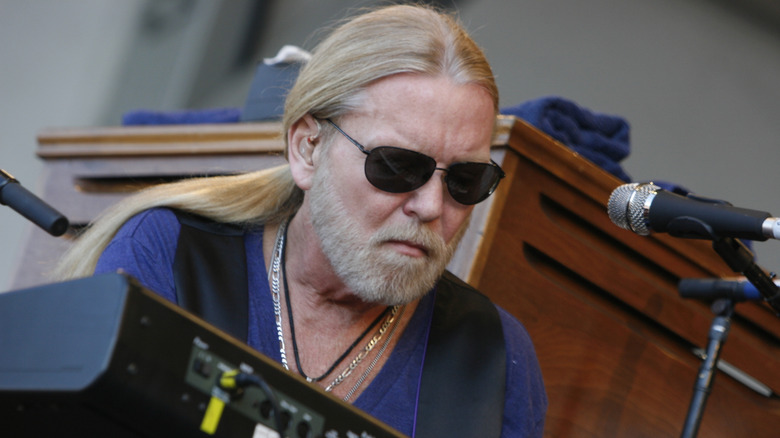Gregg Allman playing organ on stage