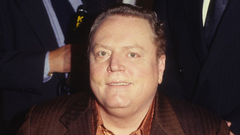 Larry Flynt posing for the media