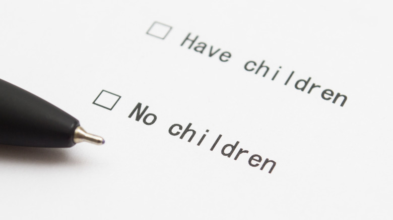 Sheet of paper with the words have children and no children written down