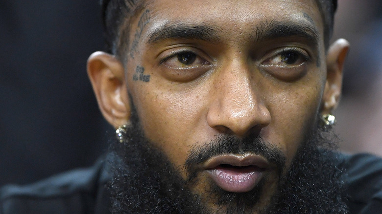 Nipsey Hussle at a basketball game