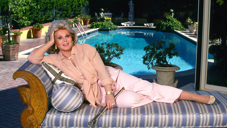 Zsa Zsa Gabor by a pool