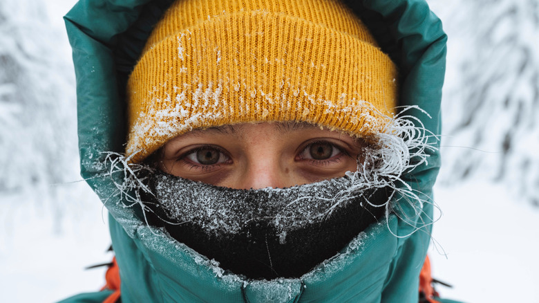 woman's face in mountaineering clothing