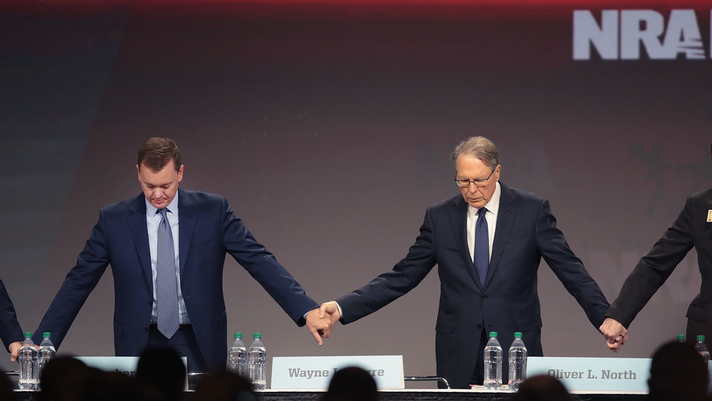 Wayne LaPierre in prayer