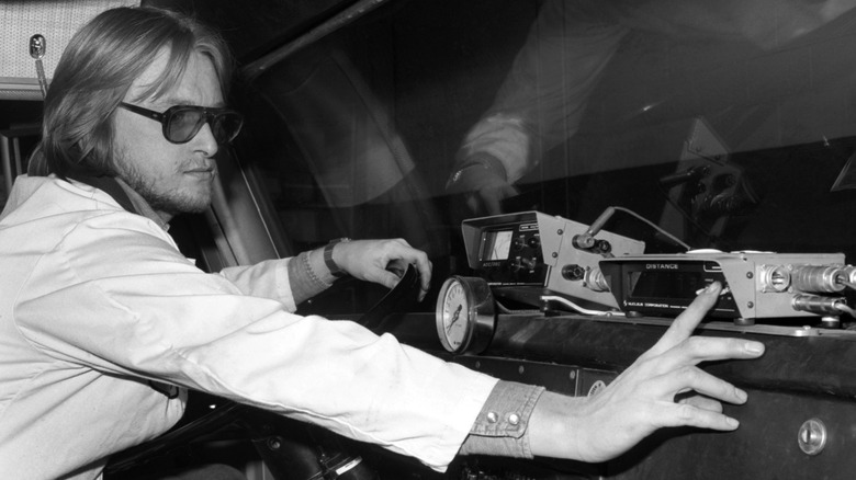 Truck driver in 1977 using CB radio