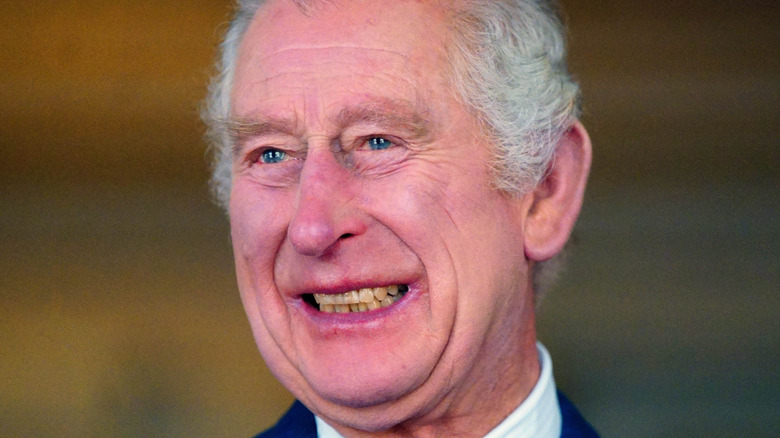 King Charles III smiling