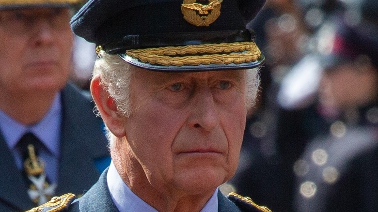 King Charles III sporting cap