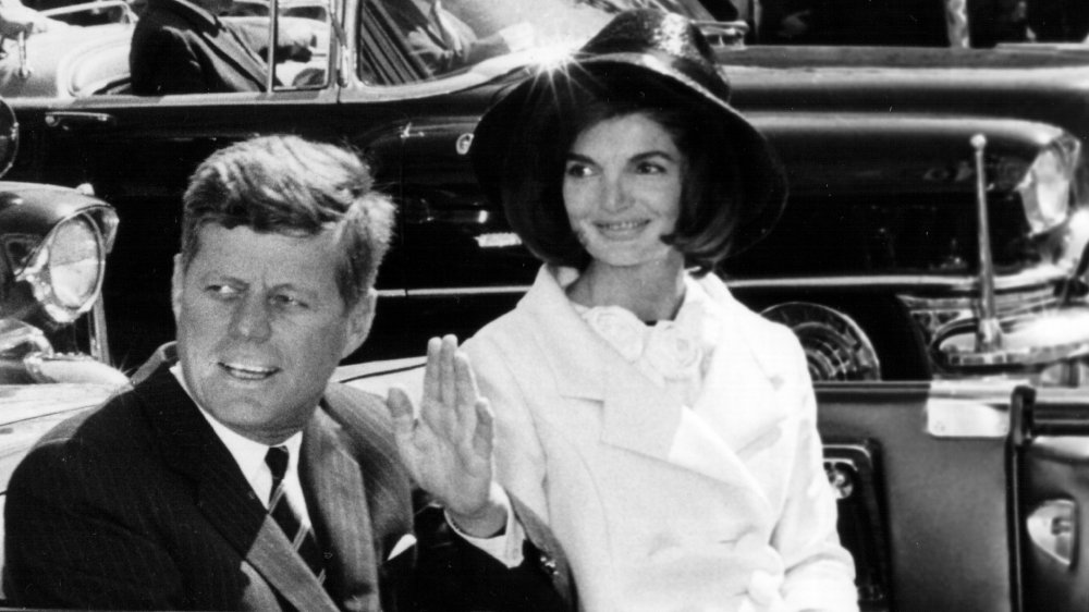 John F. Kennedy at parade with Jackie Kennedy