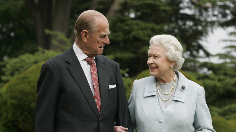 Prince Phillip walking with Queen Elizabeth II