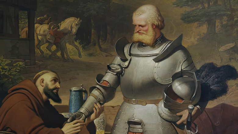 painting of Gotz von Berlichingen in armor holding metal hand to monk