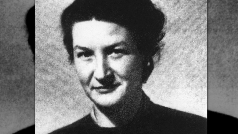 photo of Virginia Hall smirking in dark jacket