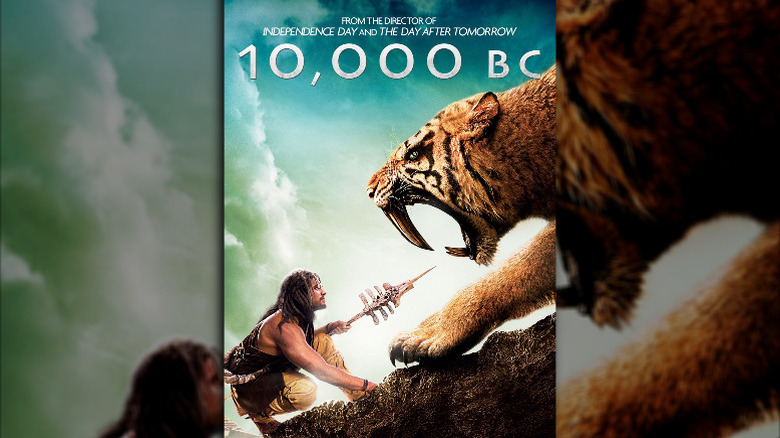 10,000 BC Poster with caveman holding spear to saber tooth tiger
