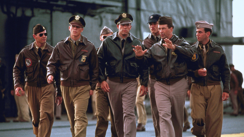 Josh Hartnett, Ben Affleck, and Alec Baldwin walking in aviator jackets in 'Pearl Harbor'