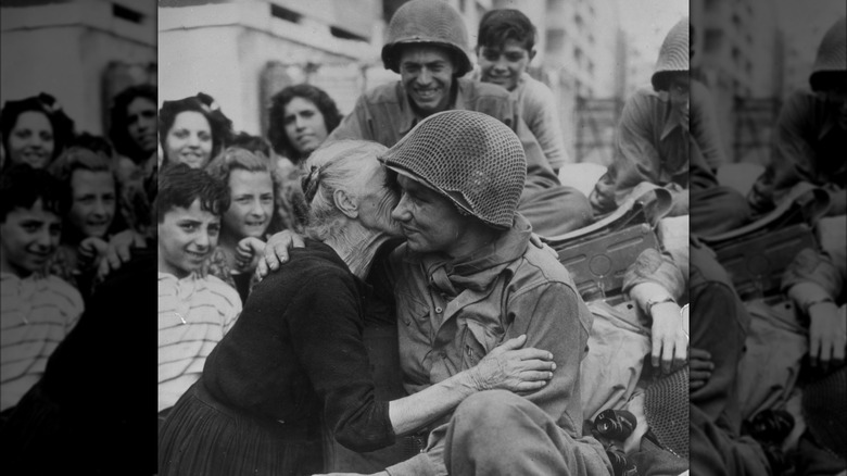 Italian woman kissing American GI