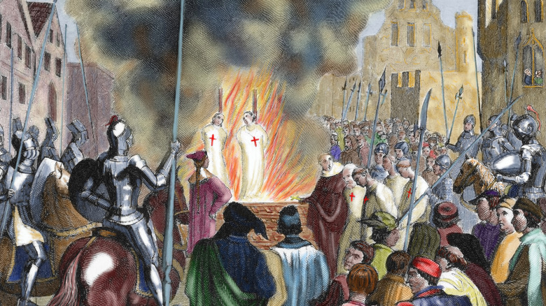 Knights Templar burning at the stake in front of crowd