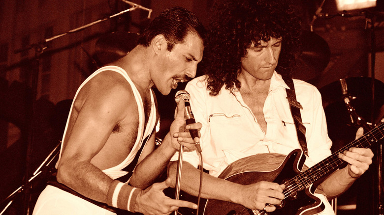 Freddie Mercury and Brian May of Queen performing