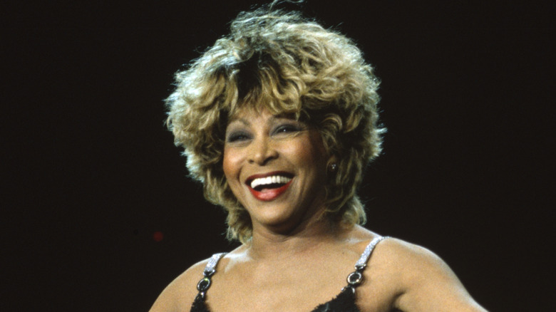 Tina Turner smiling on stage