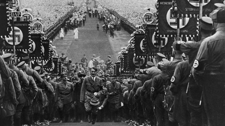 Hitler walking up the steps