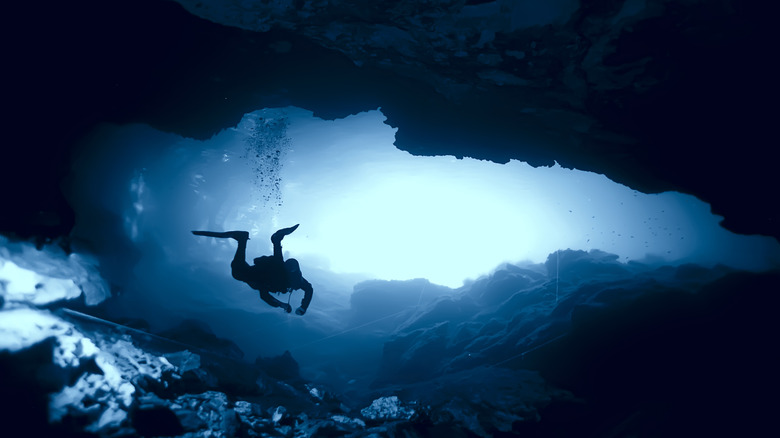 A diver in a cave