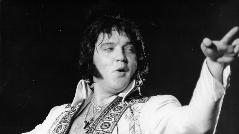 Elvis Presley performs in concert, circa l977