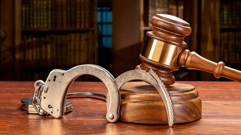 handcuffs and judge's gavel