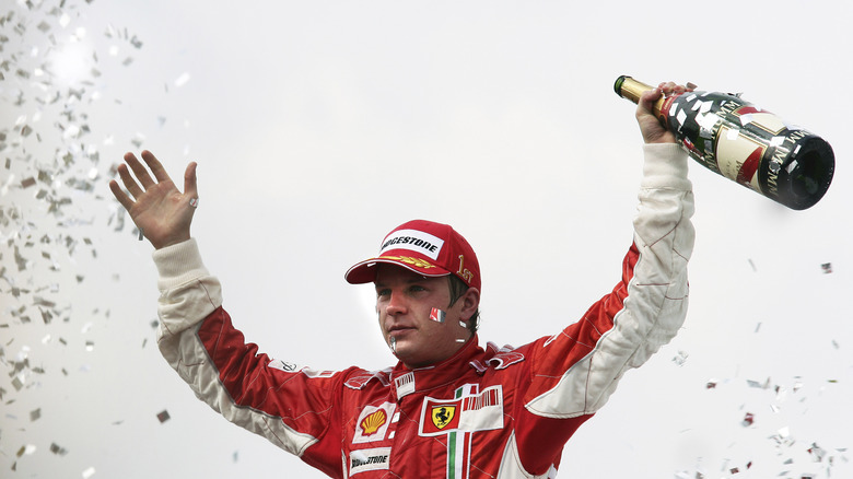Kimi Raikkonen on podium red jacket