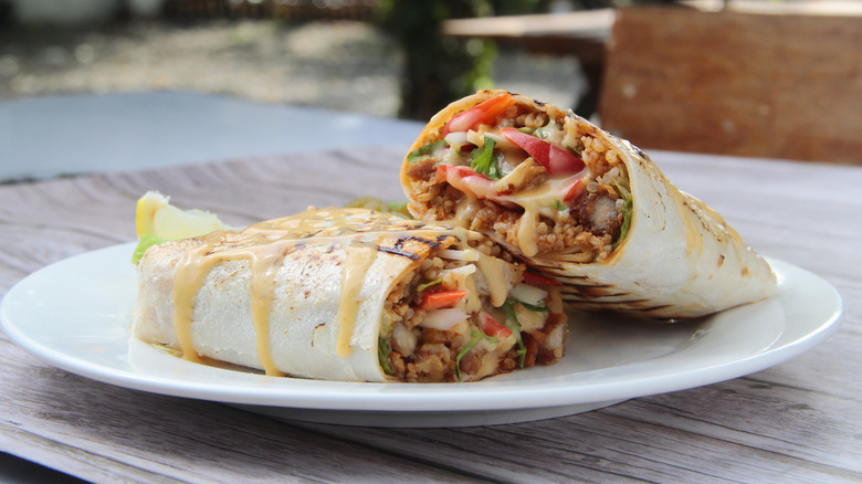 Two burritos on a plate