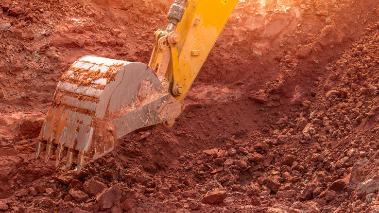a backhoe excavating