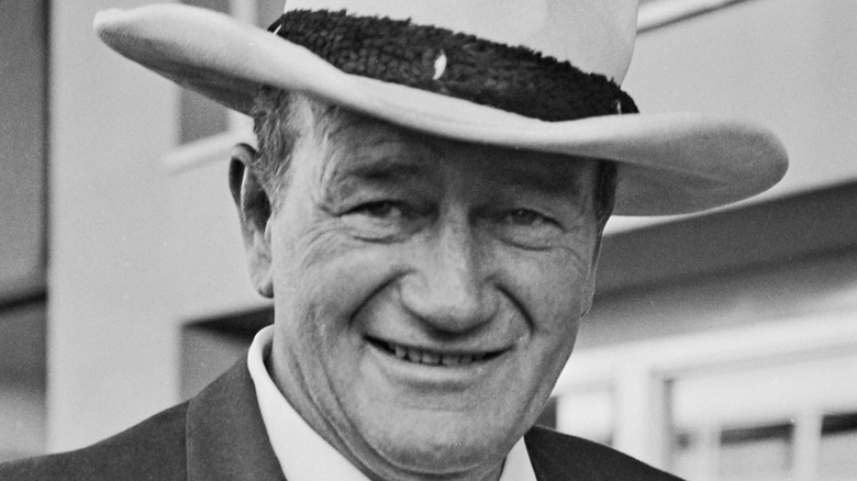 John Wayne smiles