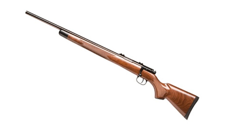 vintage rifle on white background