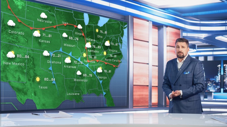TV weather reporter and map