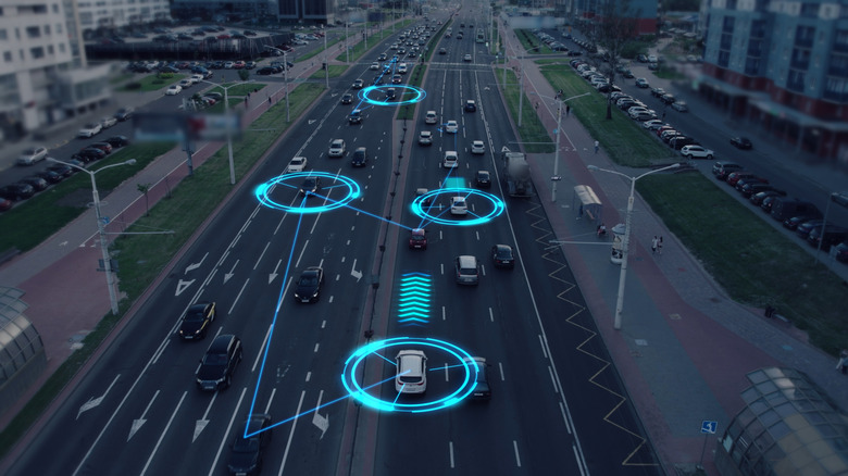 Cars on a highway with glowing AI autonomous vehicle concept rings