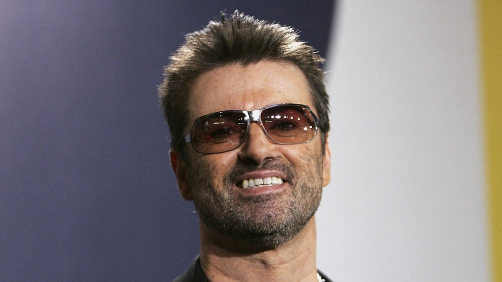 A shot of George Michael smiling