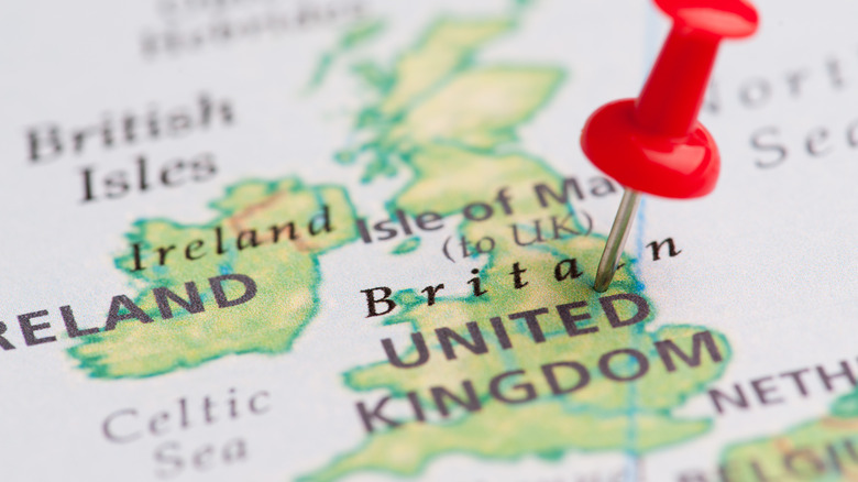 A pin marks Britain on a map
