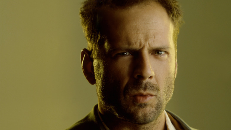 Bruce Willis frowns