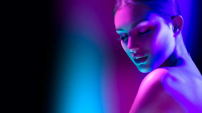 woman with colorful lights
