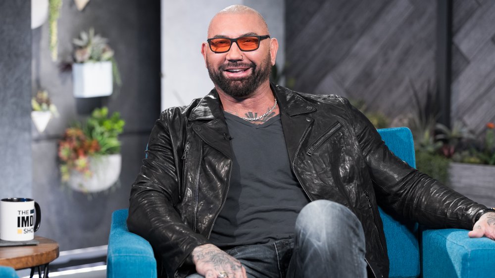 Dave Bautista lounges during an interview in February, 2020
