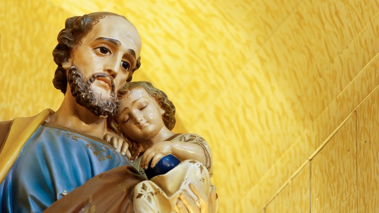 Statue of Joseph holding Jesus