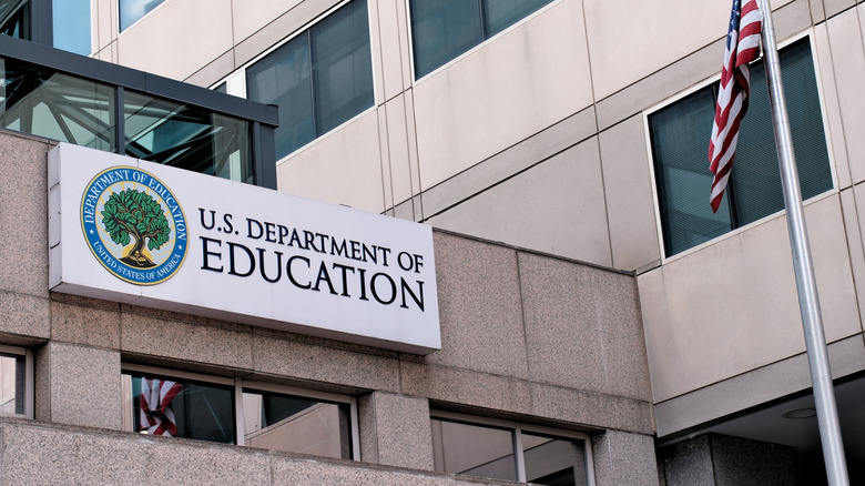 Sign and flag outside U.S. Department of Education