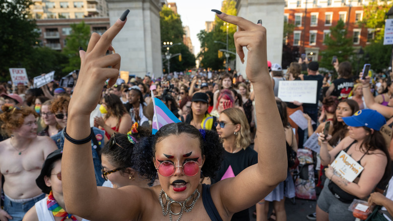 Woman gestures in protest