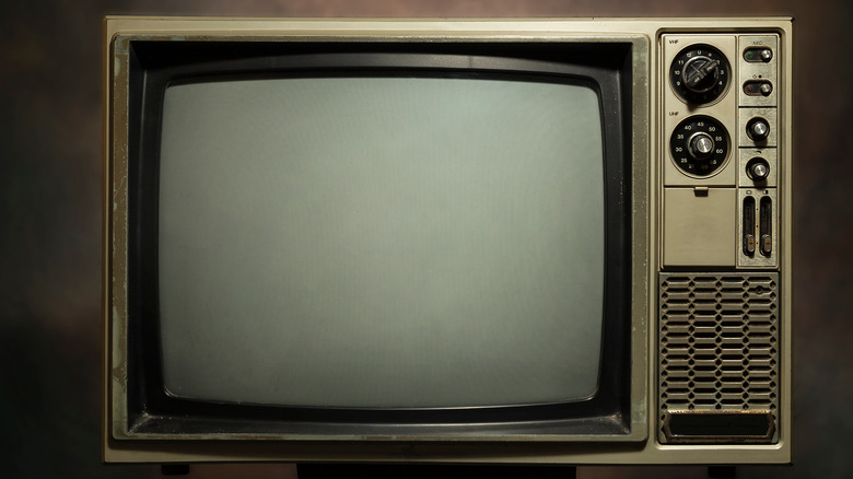 Old television against dark background