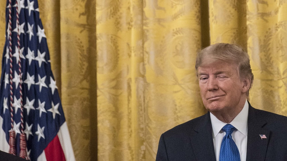 Trump winking and American flag