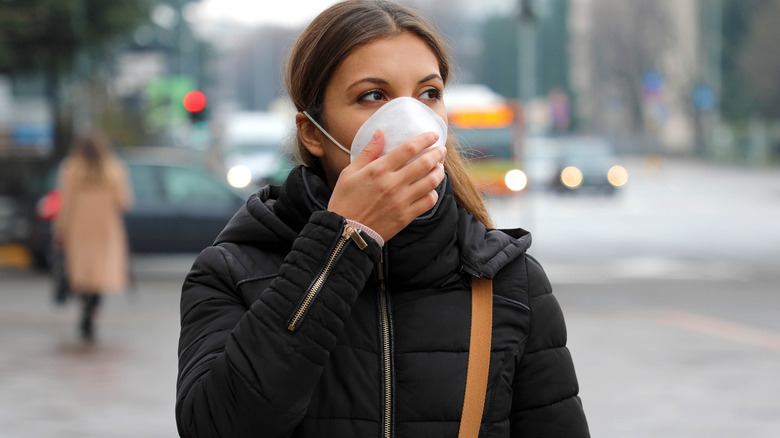 woman with mask protection against diseases