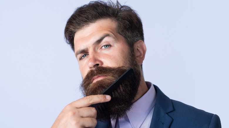 guy coming beard raised eyebrow