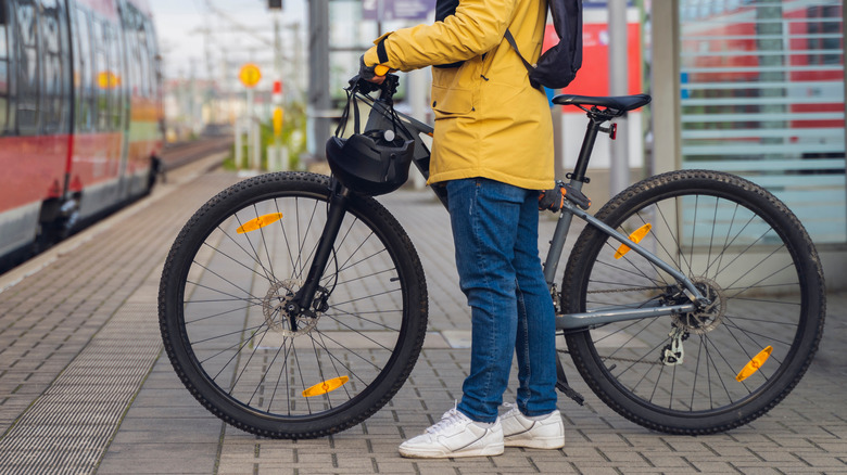 person with bicycle